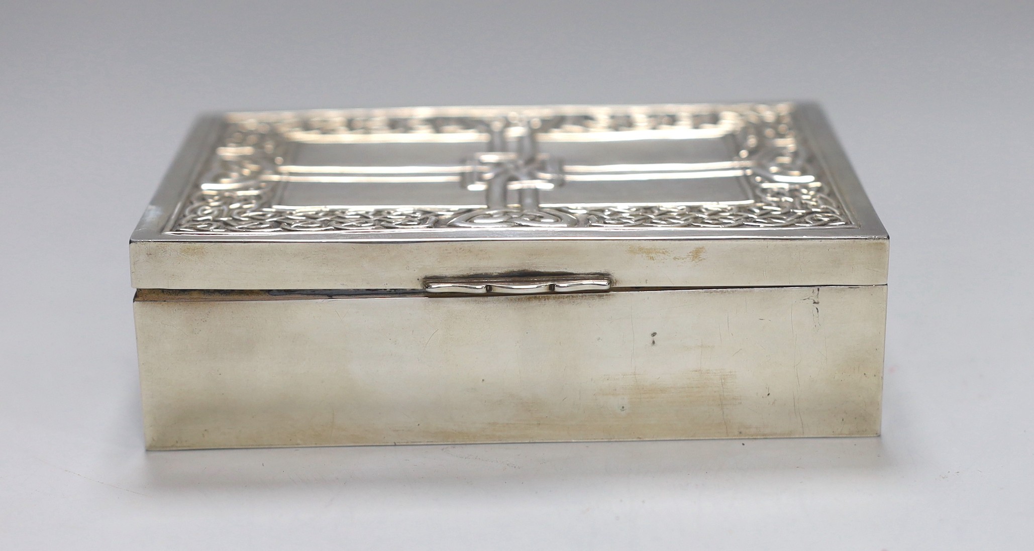 A Scottish white metal Iona rectangular box and cover, with Celtic knot decoration, 13.2cm, 8.7oz, stamped 'Iona AR', for Alexander Ritchie?